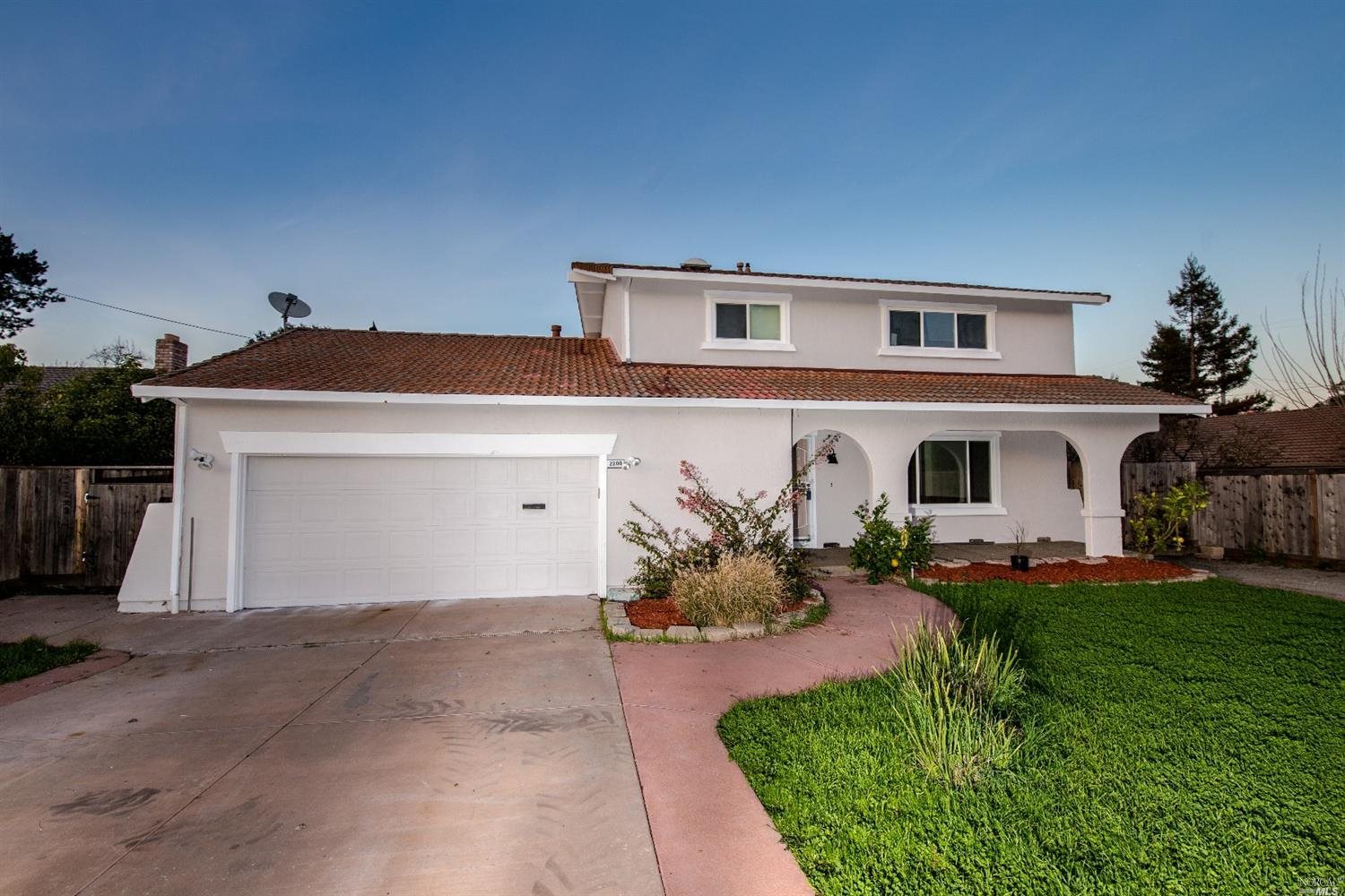2200 Center Road Novato, CA 94947 - Photo 1 of 1 a front view of a house with a yard and garage