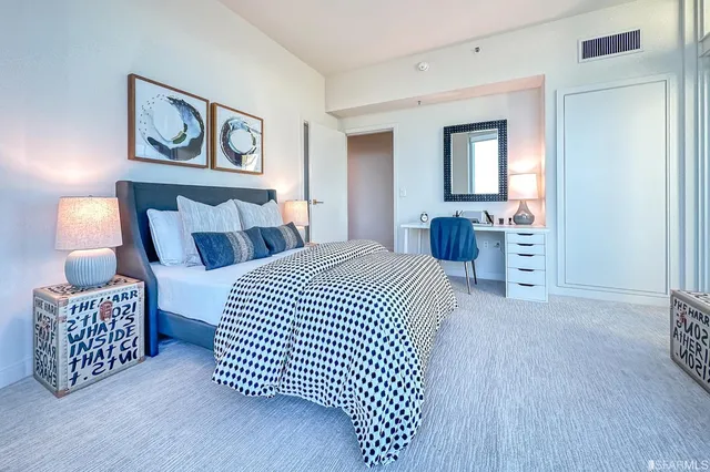 a bathroom with a tub and shower