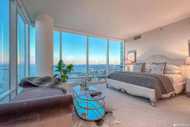 a view of swimming pool from a balcony