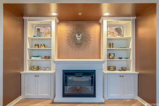 a kitchen with stainless steel appliances granite countertop a stove and a microwave