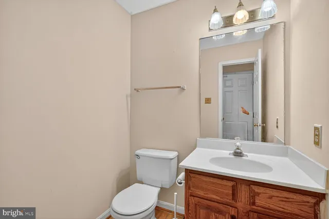 a kitchen with a stove top oven sink and cabinets
