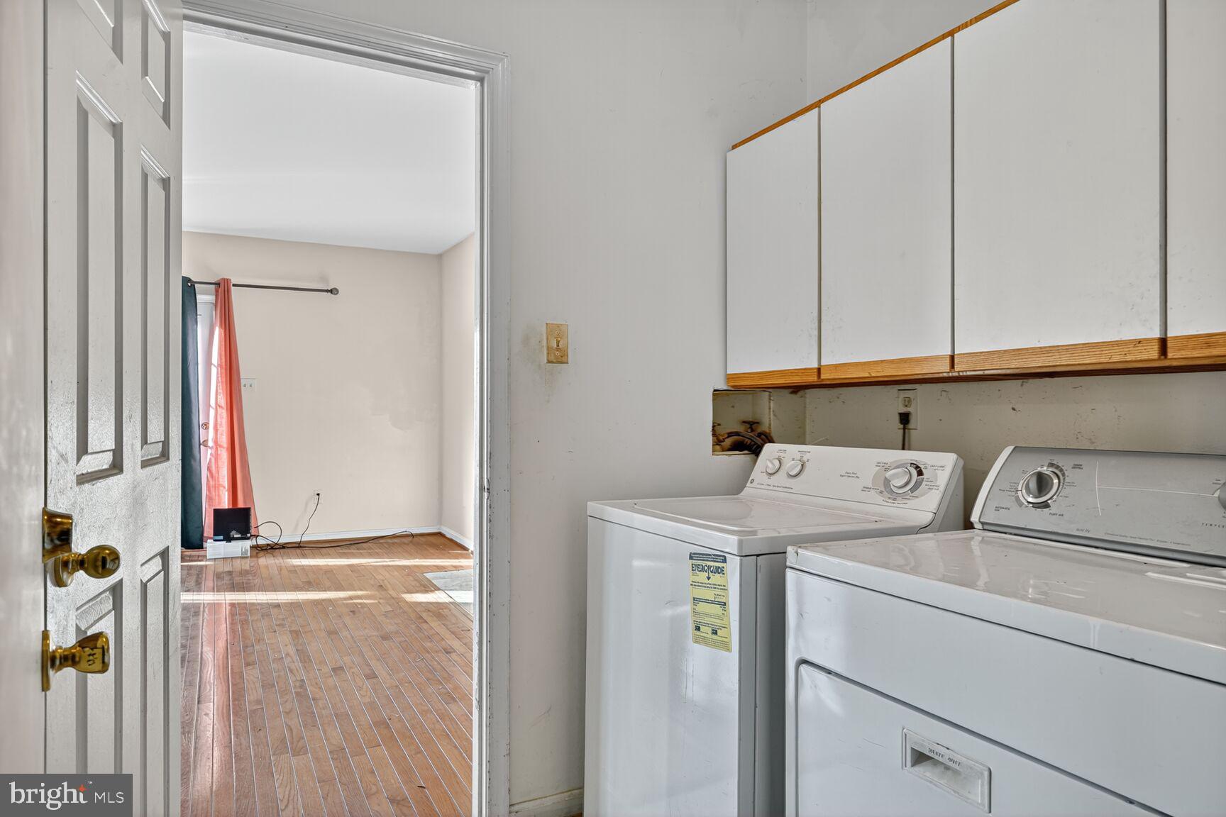 12416 Loft Lane Silver Spring, MD 20904 - Photo 18 of 25 a utility room with dryer and washer
