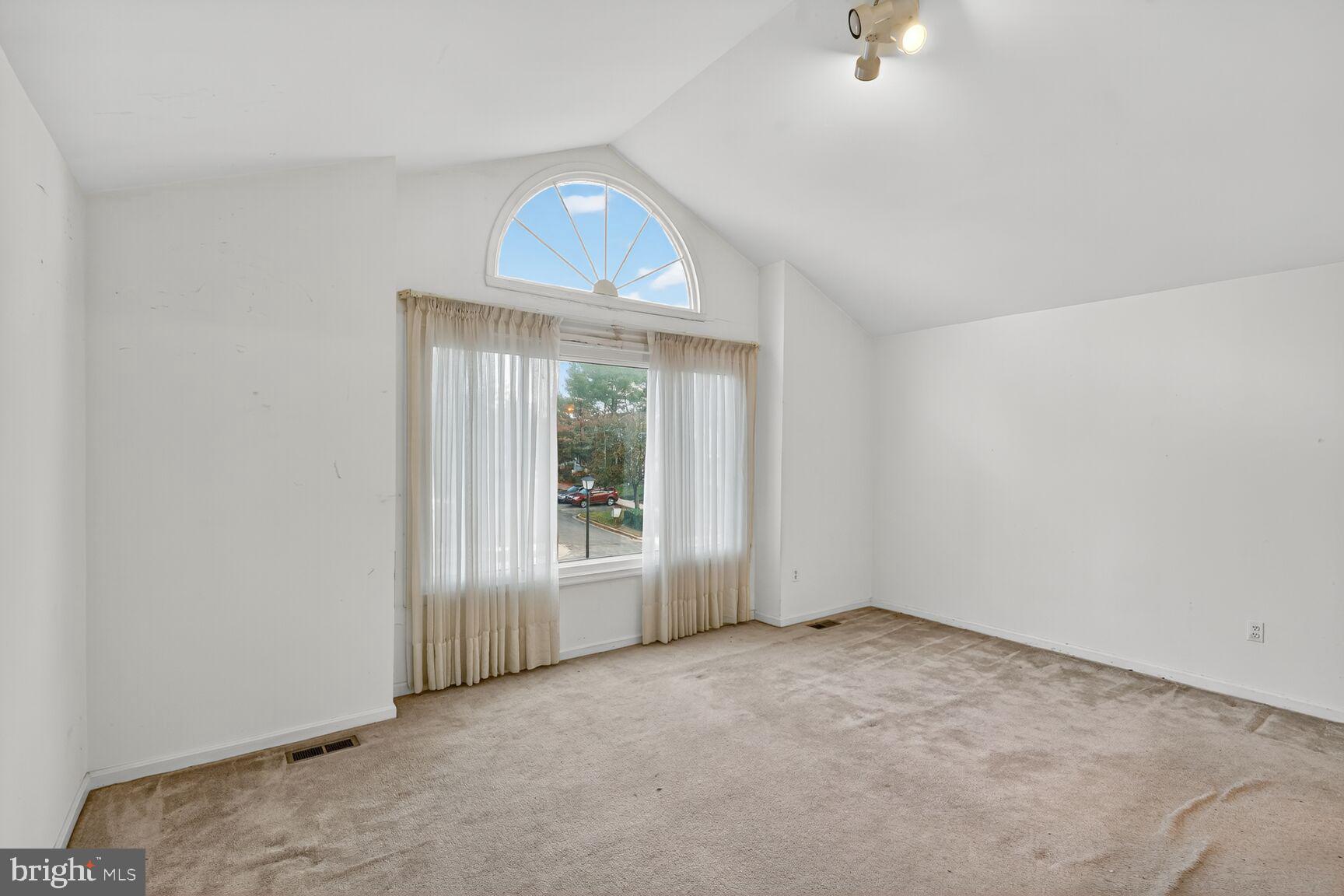 12416 Loft Lane Silver Spring, MD 20904 - Photo 22 of 25 an empty room with a window