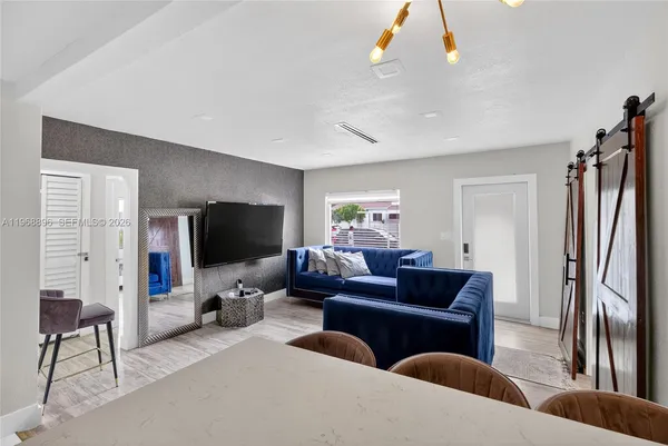 a living room with furniture and a couch