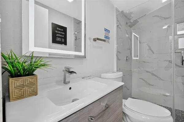 a bedroom with a bed and furniture