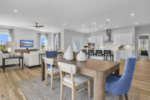1127 Masters Place Way, Unit 164 Durham, NC 27703 - Photo 13 of 45 a view of a dining room with furniture