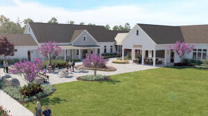 1127 Masters Place Way, Unit 164 Durham, NC 27703 - Photo 40 of 45 a view of a house with a backyard and a patio