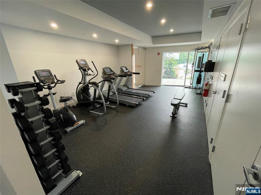 2150 North Central Road, Unit 410 Fort Lee, NJ 07024 - Photo 14 of 15 a view of a room with gym equipment