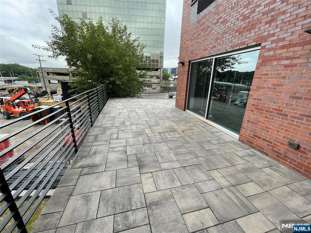 2150 North Central Road, Unit 410 Fort Lee, NJ 07024 - Photo 15 of 15 a view of a pathway both side of building
