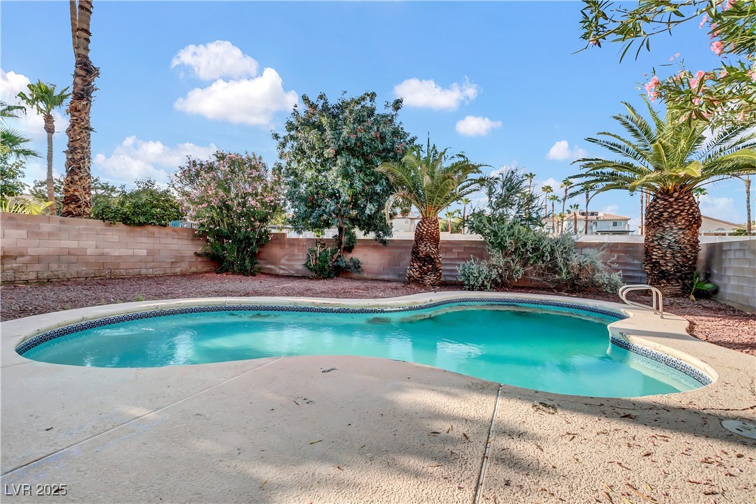 2716 Knightsbridge Road Henderson, NV 89074 - Photo 25 of 27 View of pool with a fenced backyard and a patio area