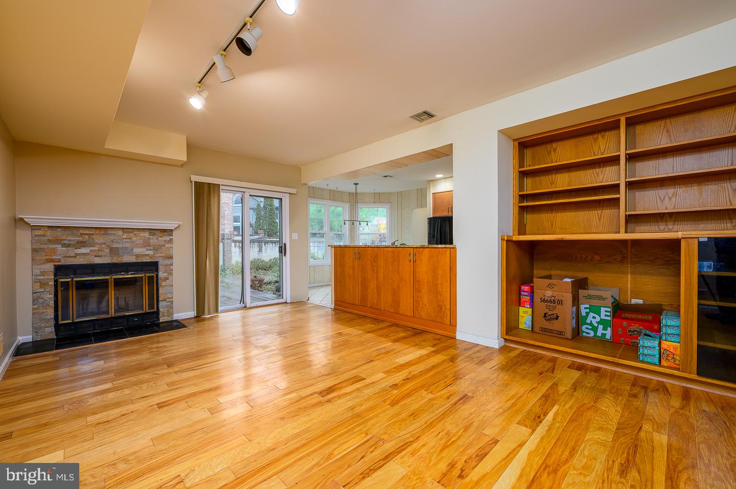 28 Stonebridge Lane Princeton, NJ 08540 - Photo 16 of 34 a view of an empty room with a fireplace and a window