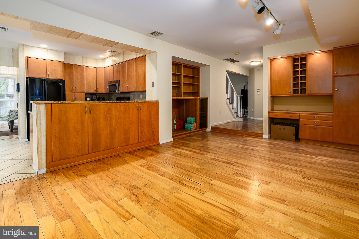 28 Stonebridge Lane Princeton, NJ 08540 - Photo 17 of 34 a view of a livingroom with kitchen