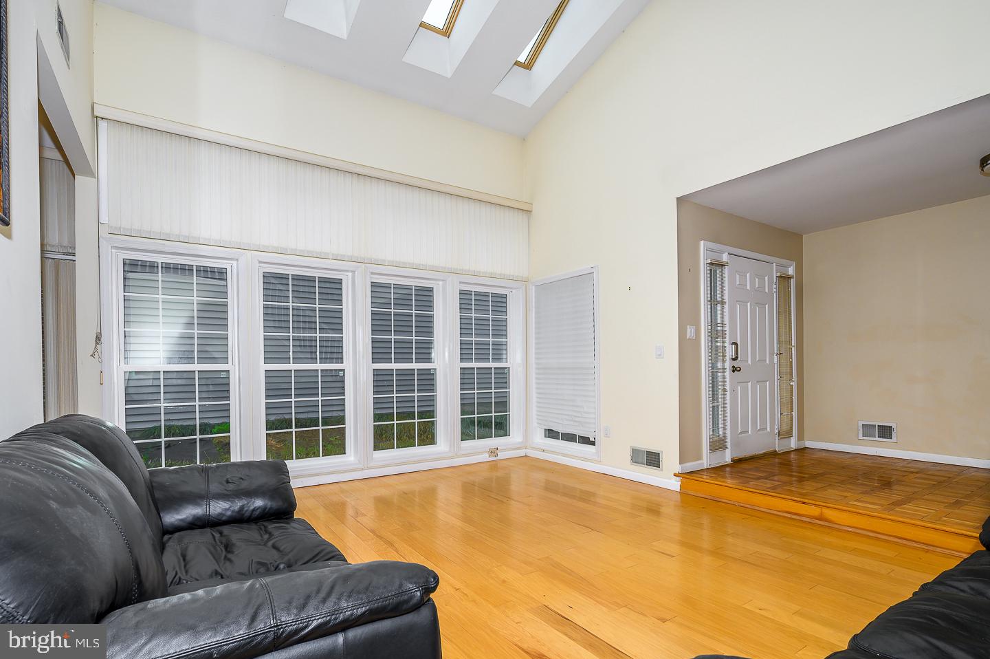 28 Stonebridge Lane Princeton, NJ 08540 - Photo 5 of 34 a living room with a couch and large window