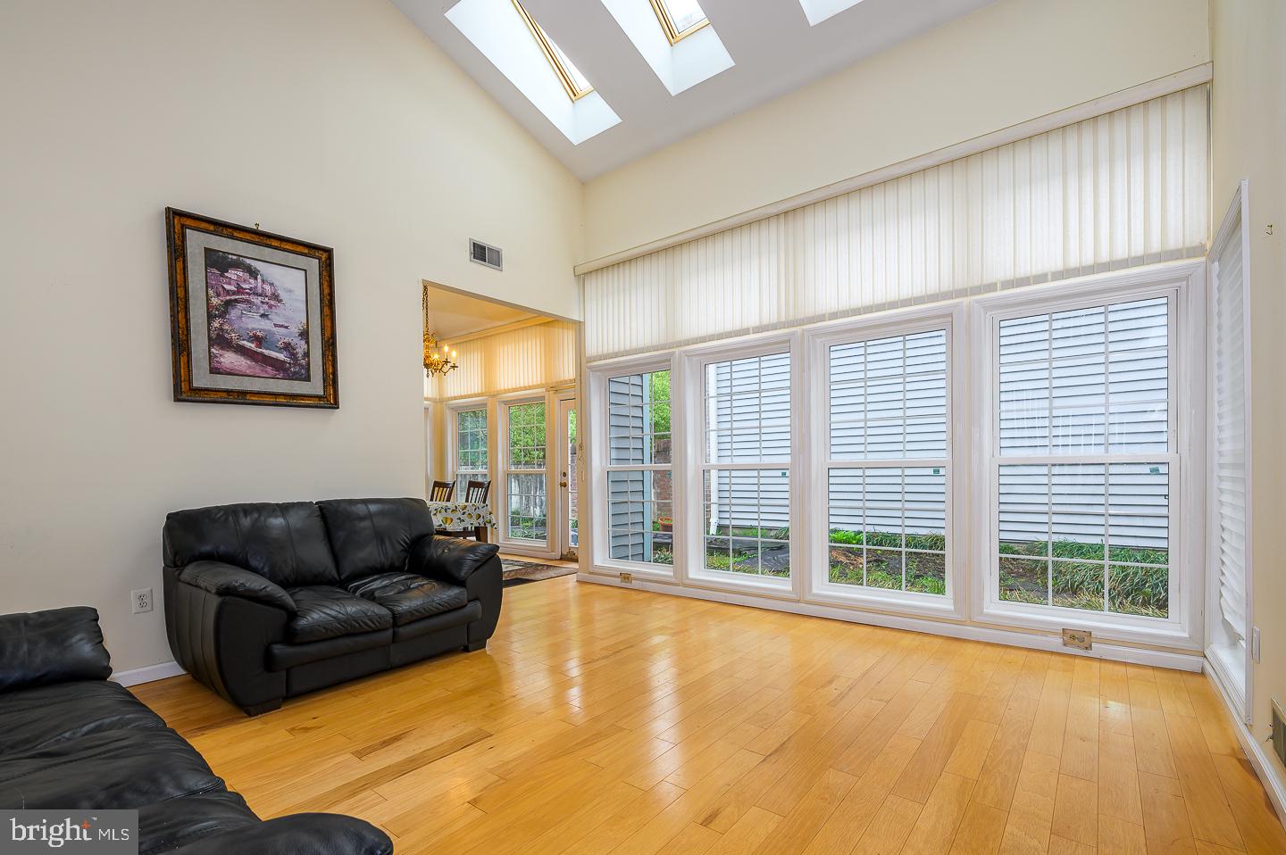 28 Stonebridge Lane Princeton, NJ 08540 - Photo 6 of 34 a living room with furniture and large windows