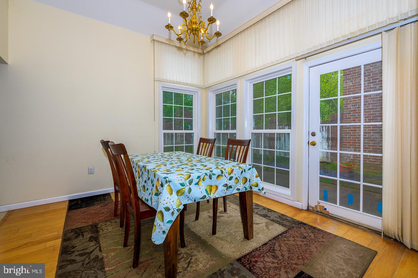 28 Stonebridge Lane Princeton, NJ 08540 - Photo 8 of 34 a dining room with furniture a rug and wooden floor