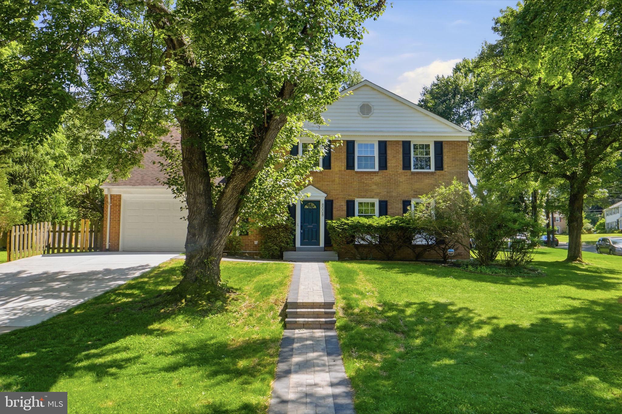 8008 Inspection House Road Potomac, MD 20854 - Photo 43 of 43 Charming brick home with lush greenery.