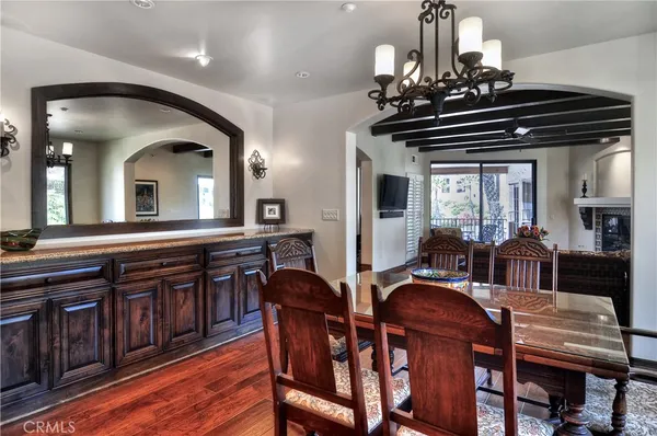a kitchen with a stove a sink and cabinets