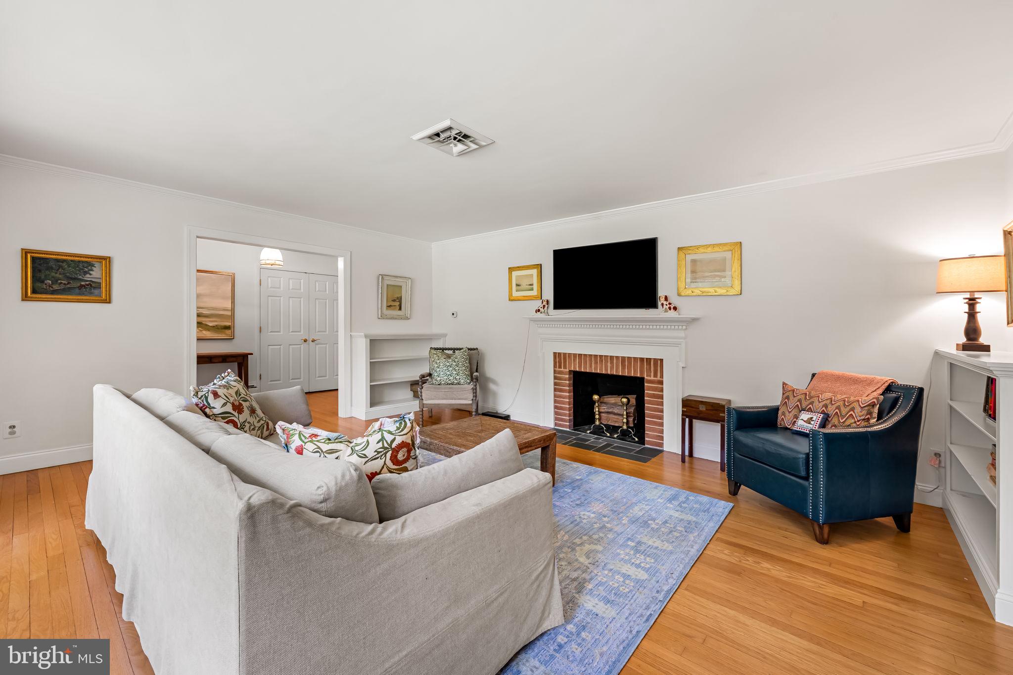 727 Old Belfast Road Sparks, MD 21152 - Photo 7 of 55 Bright Living Room with wood burning fireplace.