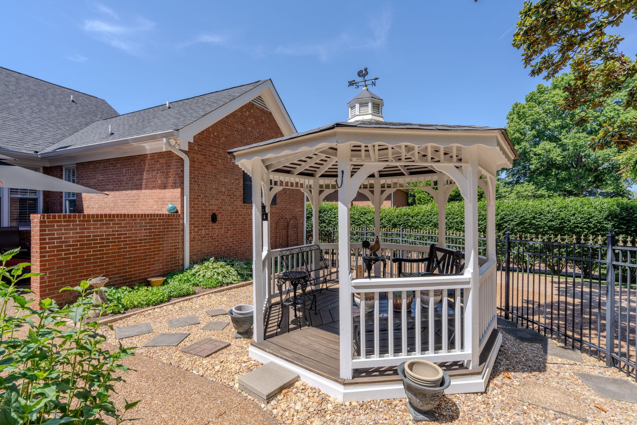 404 Chesterfield Place Franklin, TN 37064 - Photo 30 of 38 a front view of a house with garden