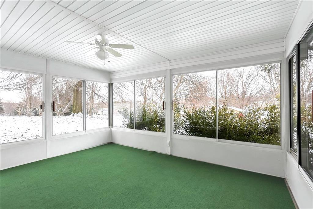 502 Springdale Road Eighty Four, PA 15330 - Photo 20 of 24 Enjoy all the seasons from this Lower Level Sun Room! Sliding glass windows allow for fresh air and plenty of natural lighting and gorgeous views plus a ceiling fan w/light.