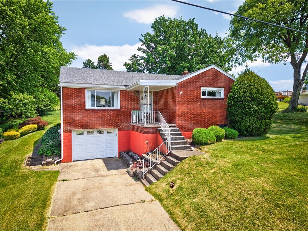 186 William Street McKees Rocks, PA 15136 - Photo 2 of 45 a backyard of a house with seating space