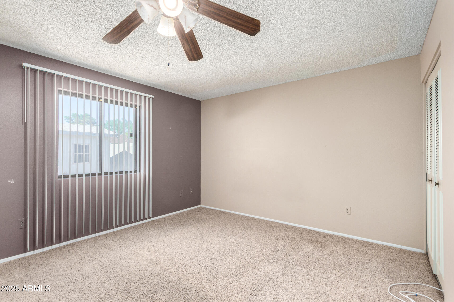 4740 West Bloomfield Road Glendale, AZ 85304 - Photo 16 of 34 a view of an empty room with a window