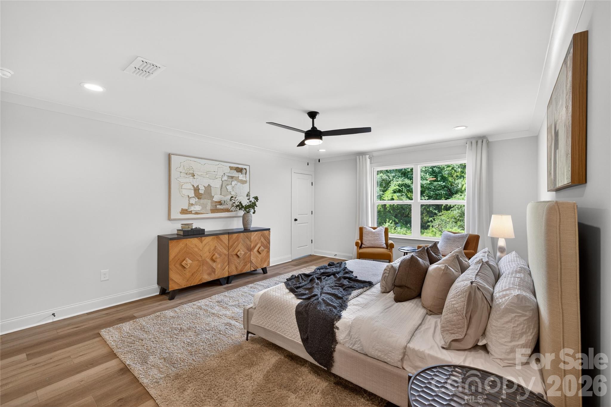2965 Polk And White Road Charlotte, NC 28269 - Photo 17 of 38 a bed room with a bed and a window