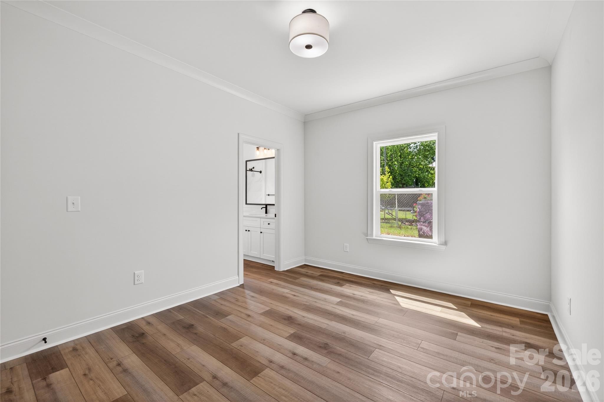 2965 Polk And White Road Charlotte, NC 28269 - Photo 24 of 38 an empty room with windows and closet