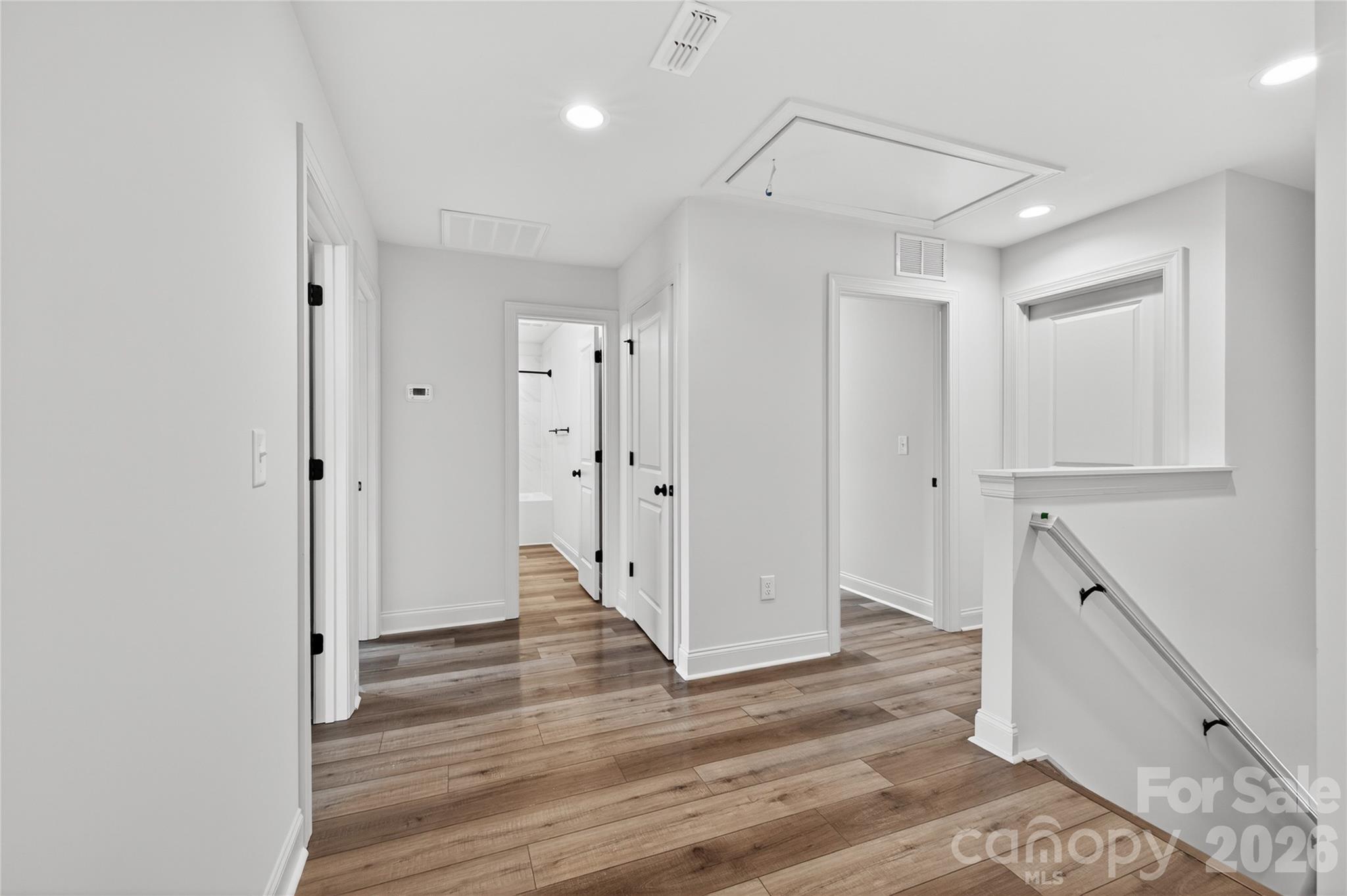 2965 Polk And White Road Charlotte, NC 28269 - Photo 27 of 38 a view of a hallway with wooden floor and entryway
