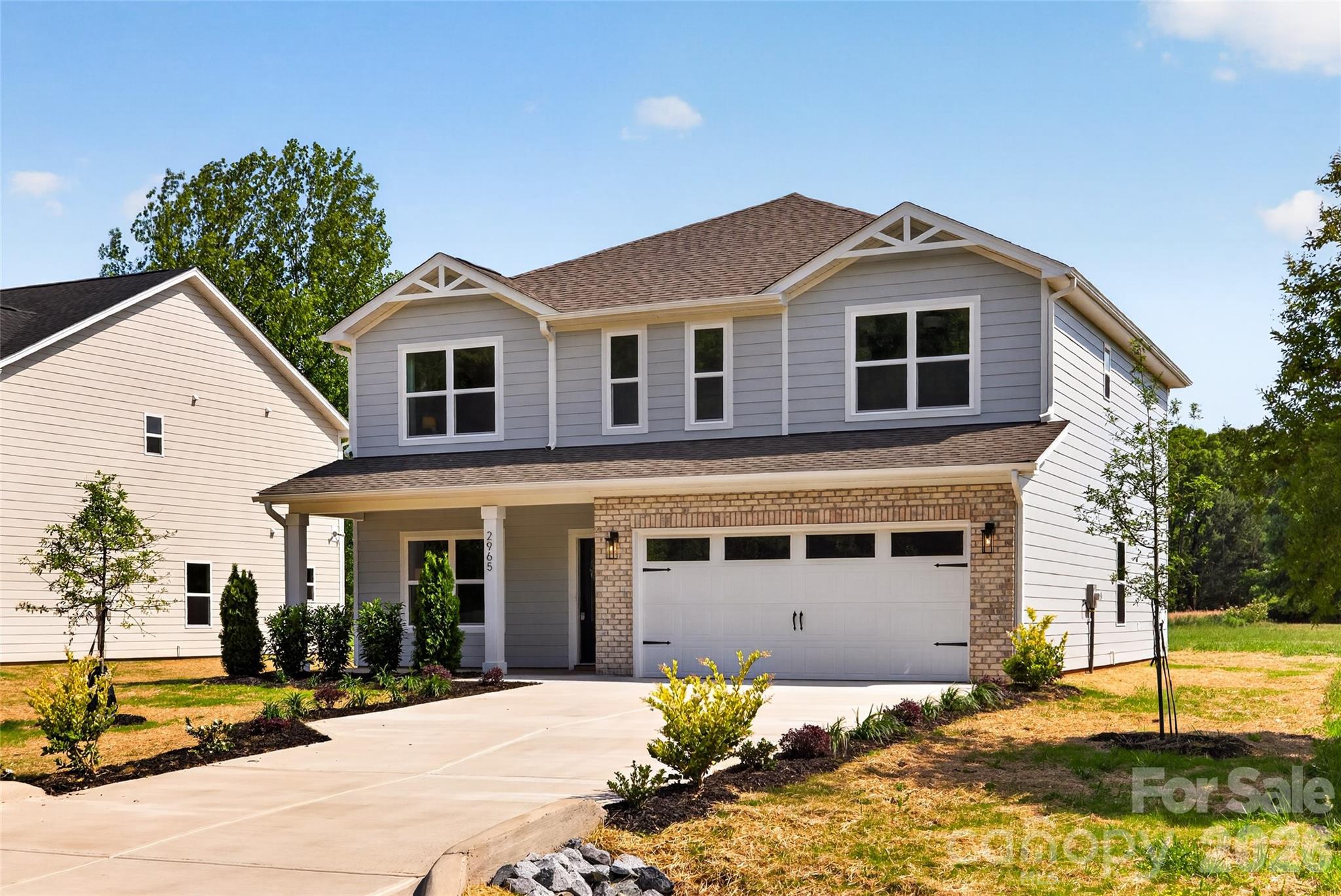 2965 Polk And White Road Charlotte, NC 28269 - Photo 3 of 38 a front view of a house with a yard
