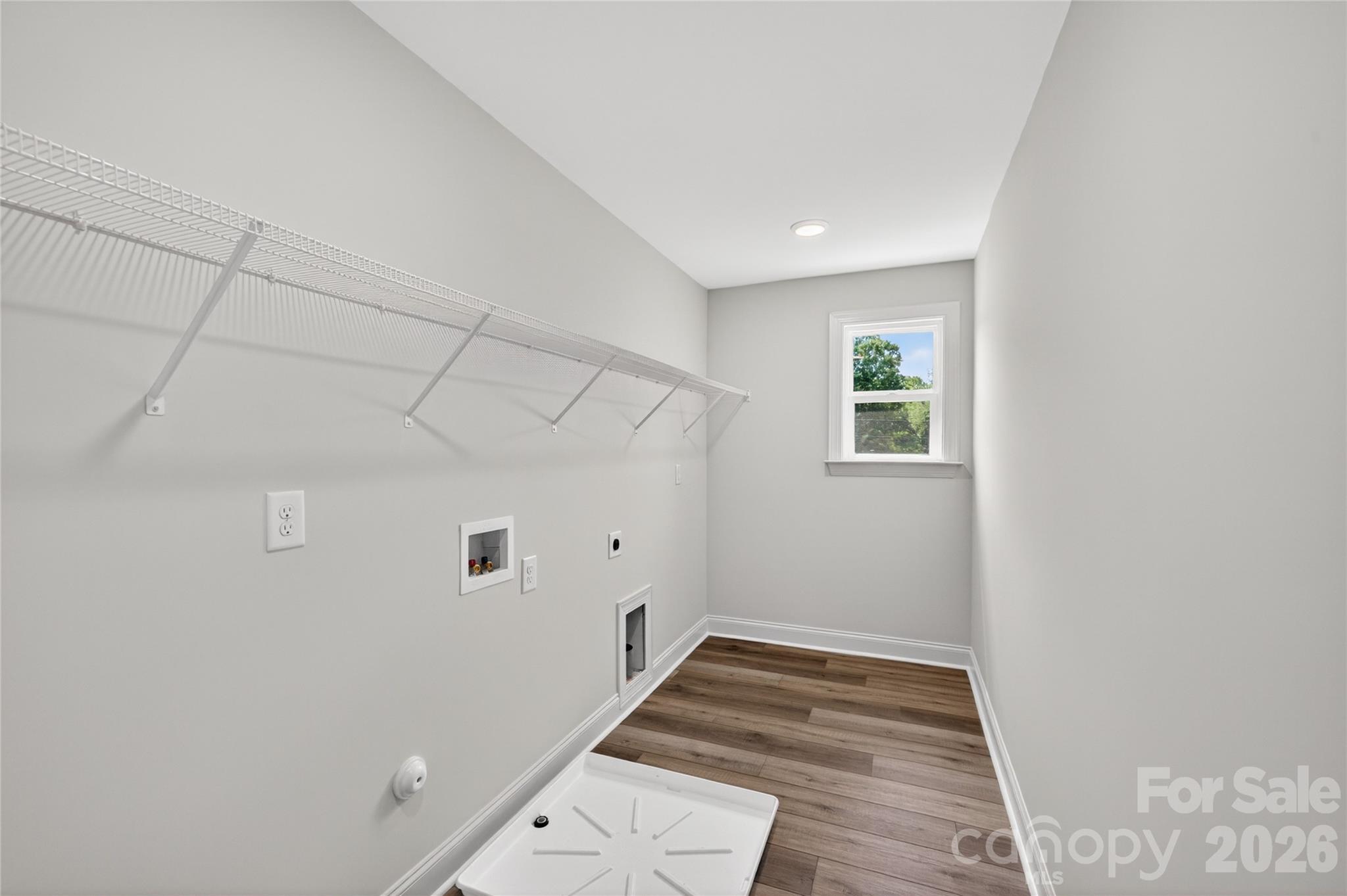 2965 Polk And White Road Charlotte, NC 28269 - Photo 35 of 38 a view of a hallway with wooden floor