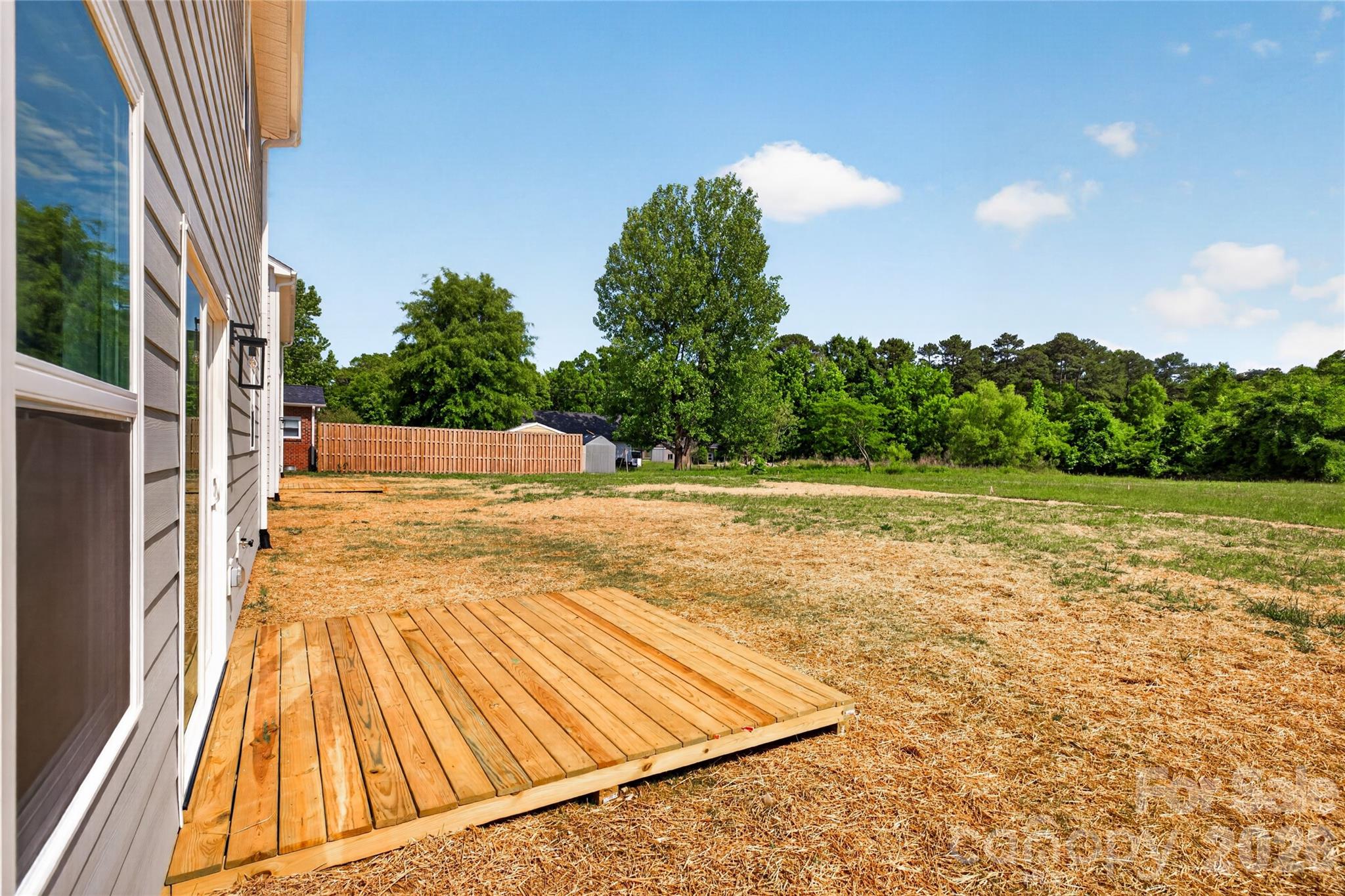 2965 Polk And White Road Charlotte, NC 28269 - Photo 37 of 38 a view of backyard with swimming pool and outdoor space