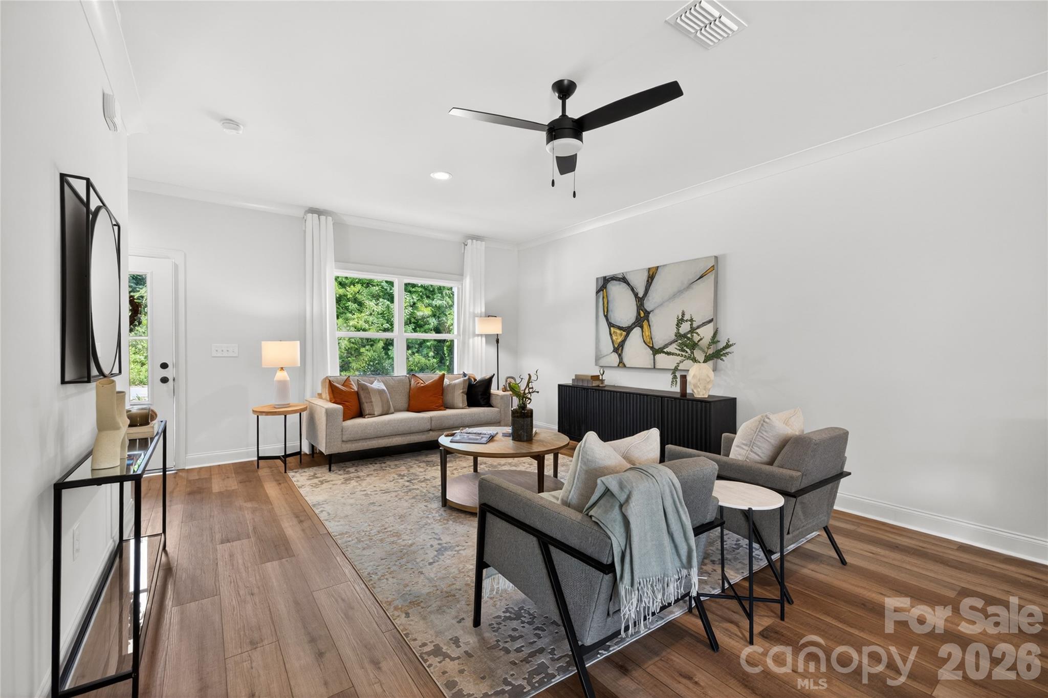 2965 Polk And White Road Charlotte, NC 28269 - Photo 5 of 38 a living room with furniture and a window
