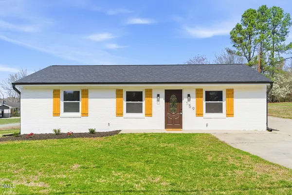 front view of house with a yard