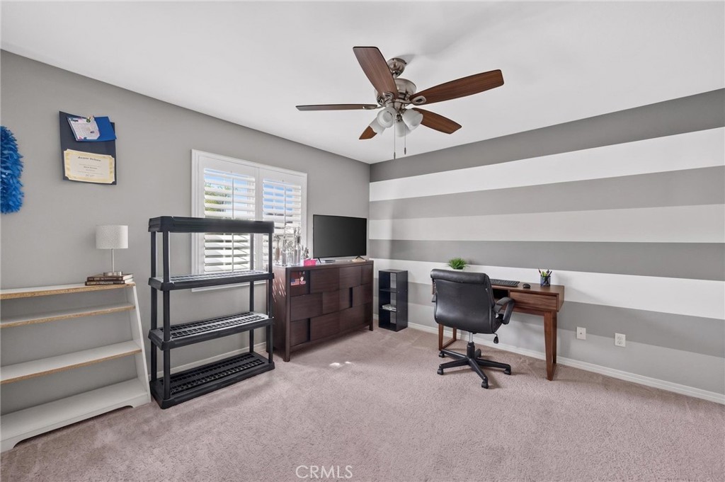 23347 Crystal Way Wildomar, CA 92595 - Photo 65 of 109 a view of a livingroom with furniture and a window
