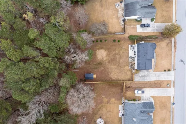 a view of a swimming pool with a patio