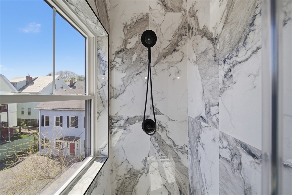 174 Walnut Street, Unit 3 Somerville, MA 02145 - Photo 17 of 38 a bathroom with a shower