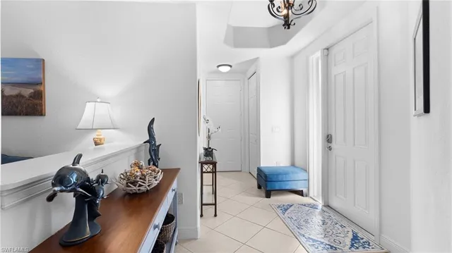 a bedroom with a bed and a table in it