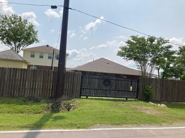 a house view with a garden space