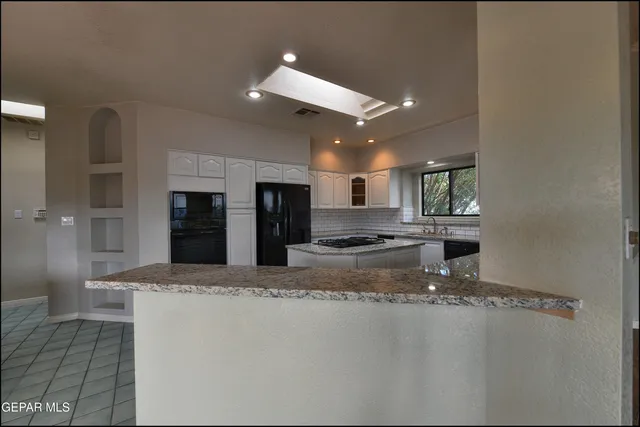 an empty room that has a window