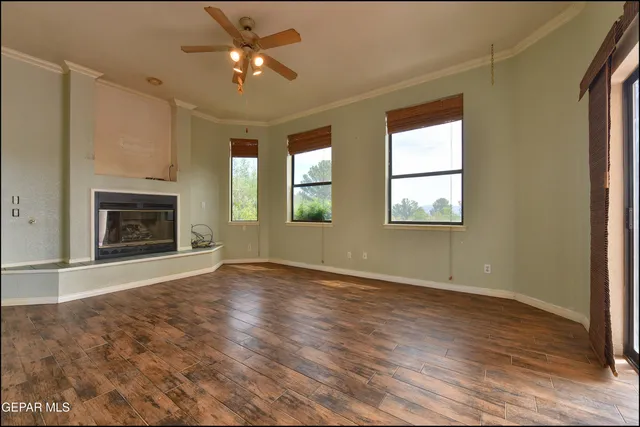a view of a entryway door with wooden floor