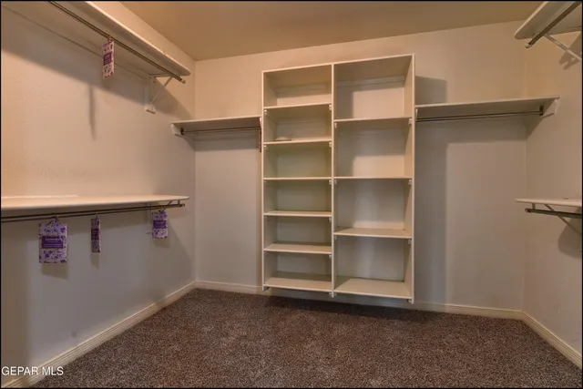 a view of a pathway with a yard