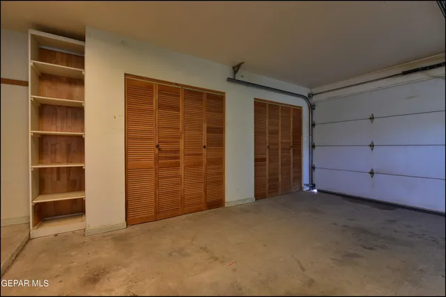 an aerial view of a house with a garden and plants