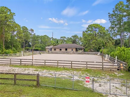 a view of a garden with an outdoor space