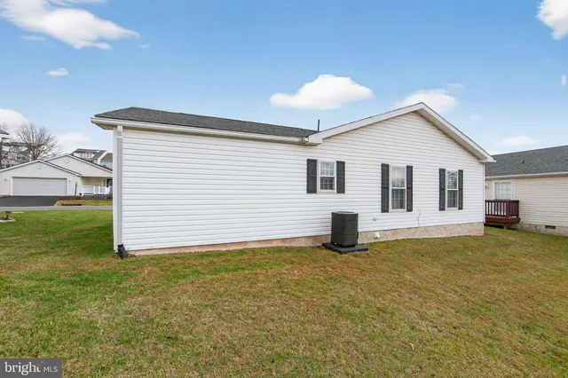 a view of a deck with a wooden fence