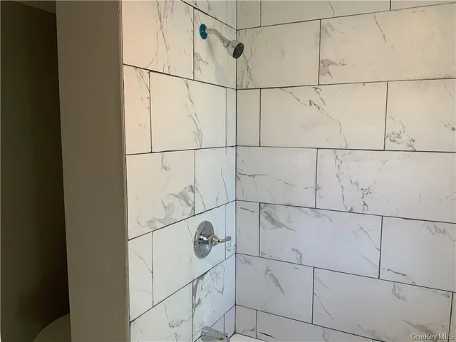 a view of entryway with stairs