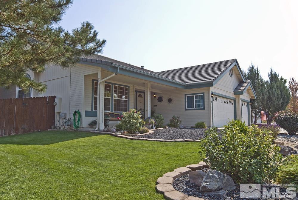 4505 Goodwin Road Sparks, NV 89436 - Photo 2 of 38 a front view of house with yard and outdoor seating