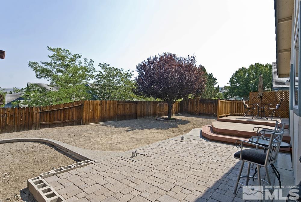 4505 Goodwin Road Sparks, NV 89436 - Photo 31 of 38 a backyard of a house with table and chairs