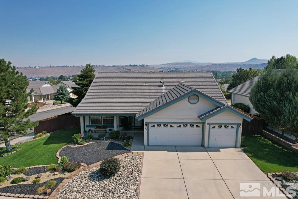 4505 Goodwin Road Sparks, NV 89436 - Photo 36 of 38 a view of house with sign board and yard