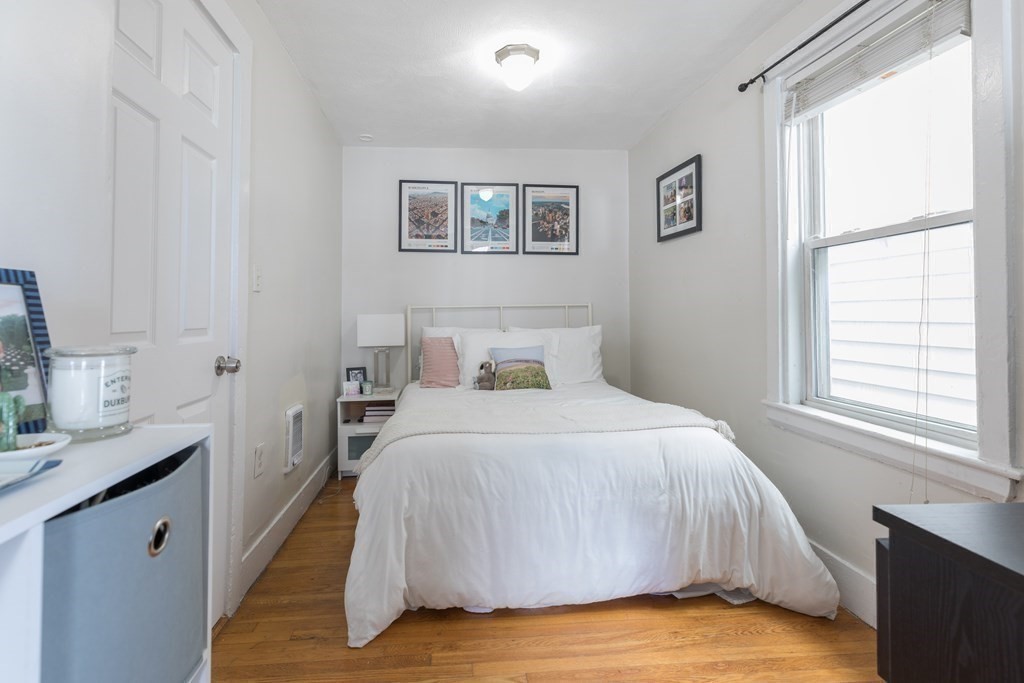 69 I Street, Unit 3 Boston, MA 02127 - Photo 9 of 14 a bedroom with a bed and a window